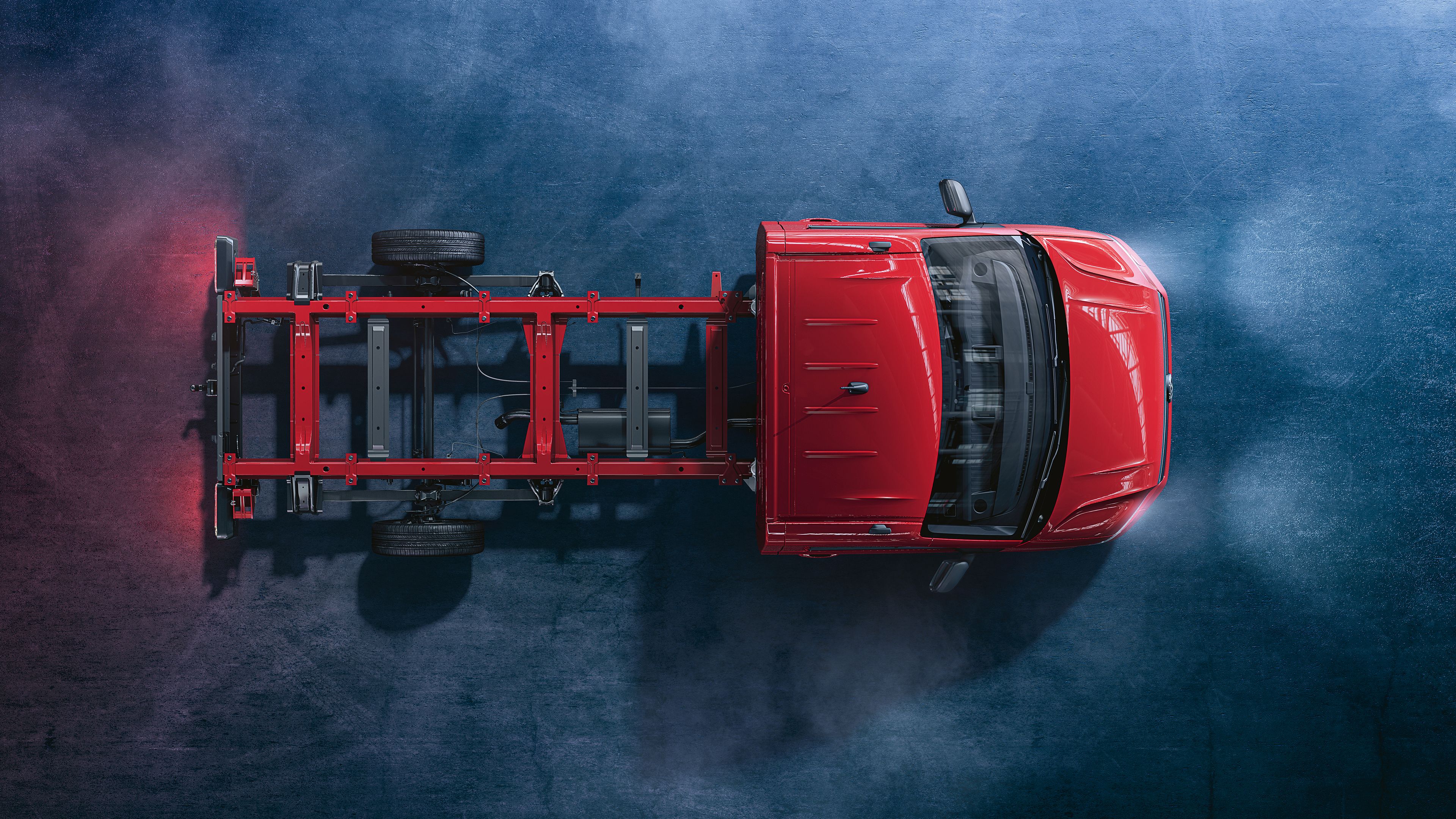 Ein rotes Volkswagen Nutzfahrzeuge Crafter Fahrgestell von oben.